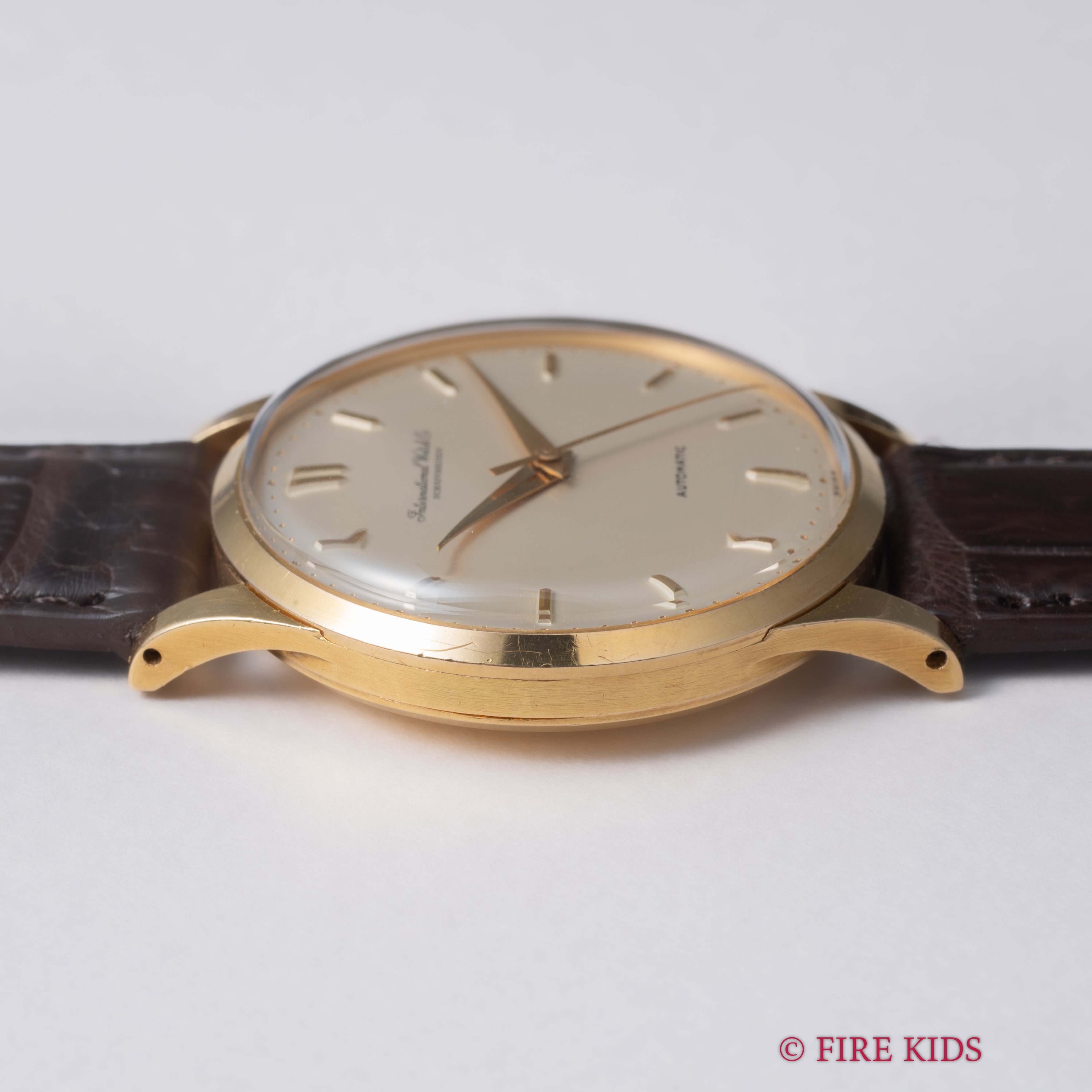 IWC ラウンドケース 1962年製 18金無垢イエローゴールド Cal.853 ノンデイト自動巻き 純正尾錠、革ベルト付き