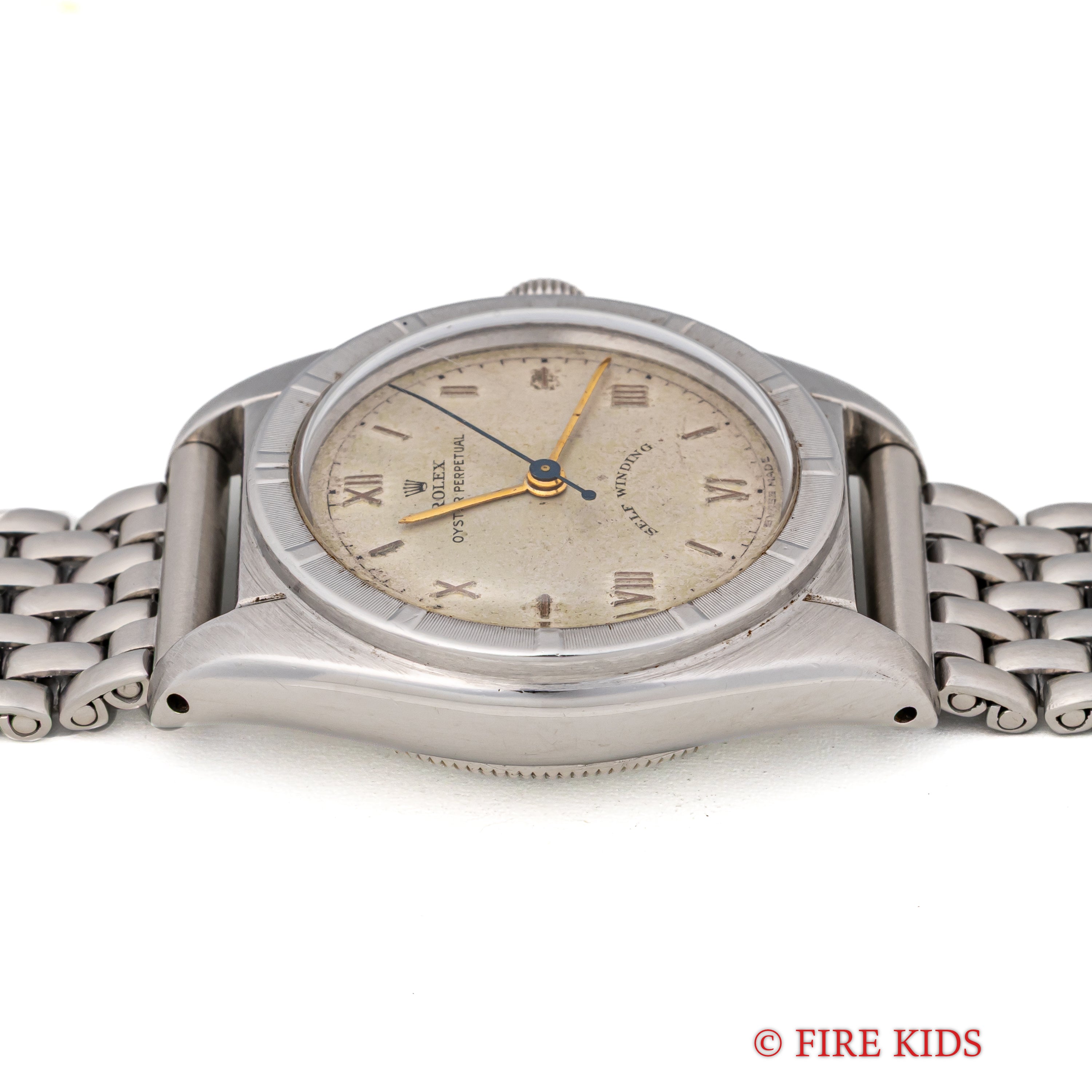 ロレックス バブルバック 1949年製 Ref.6015 自動巻 エンジンターンドベゼル 飛びローマンダイヤル 社外ライスブレス