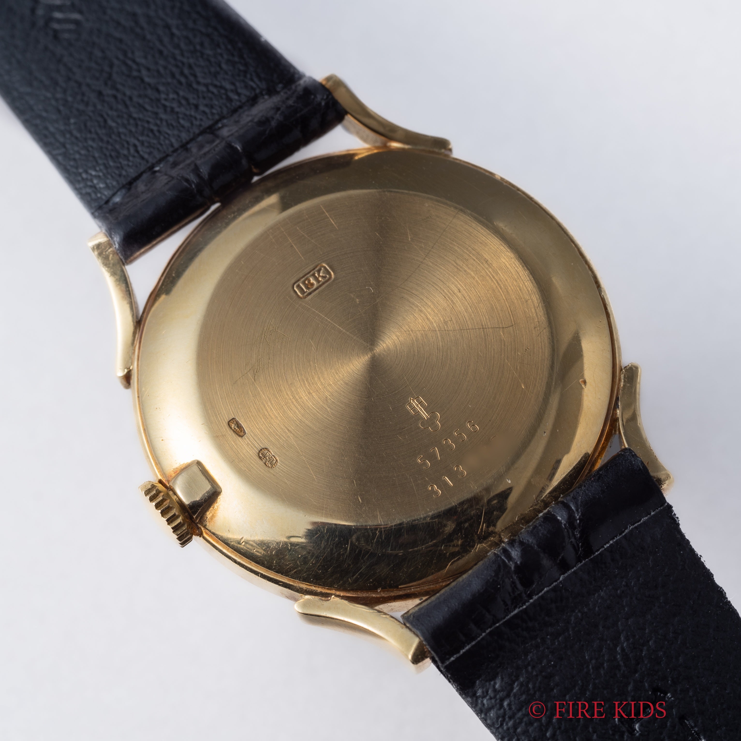 コルム 18金無垢ドレスウォッチ 1990年代製 ブラックロゴダイヤル 手巻 Cal.7001 純正GP尾錠