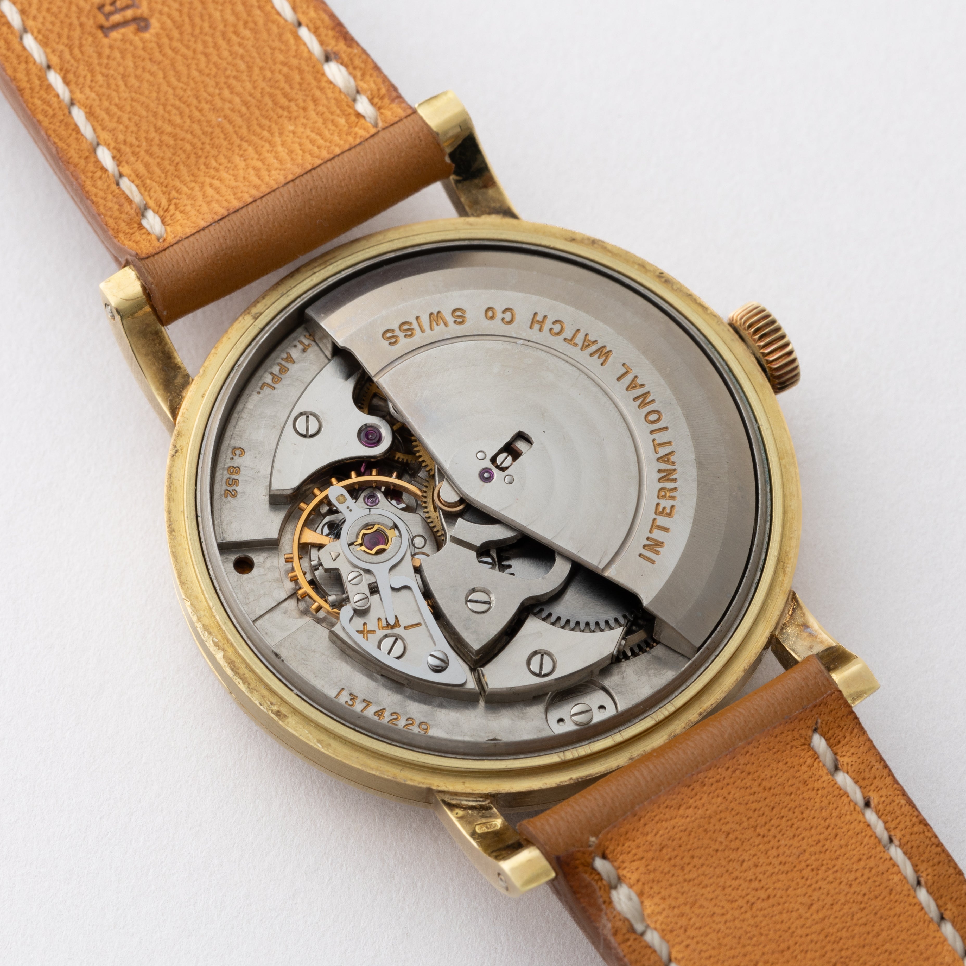 IWC 18金無垢ラウンドケース1957年製 箱、販売店ギャラ付き ペラトン式自動巻Cal.852