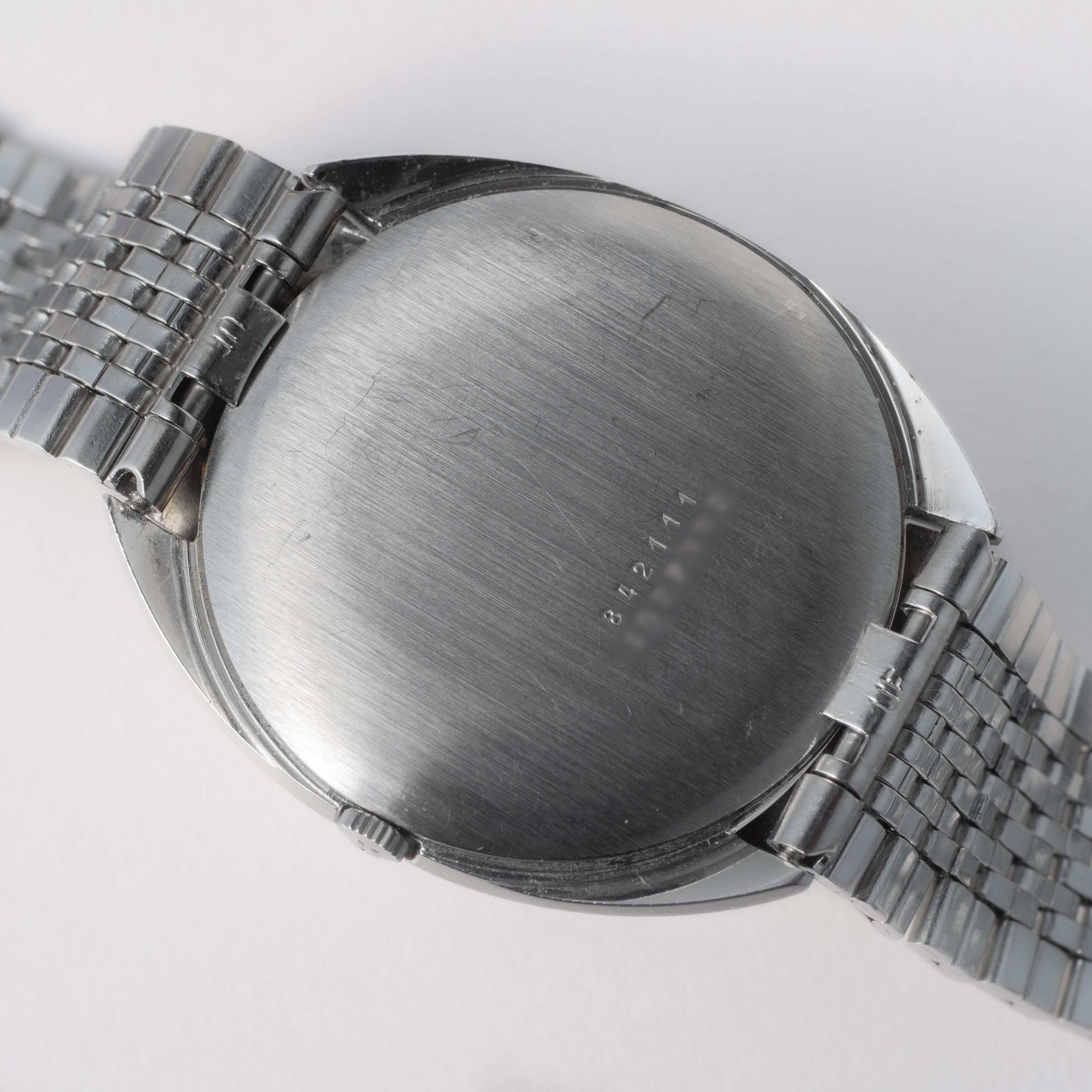 ユニバーサルジュネーブ 1970年代製 手巻き トノー型 ブルーダイヤル 純正ゲイフレアーブレス 箱付き