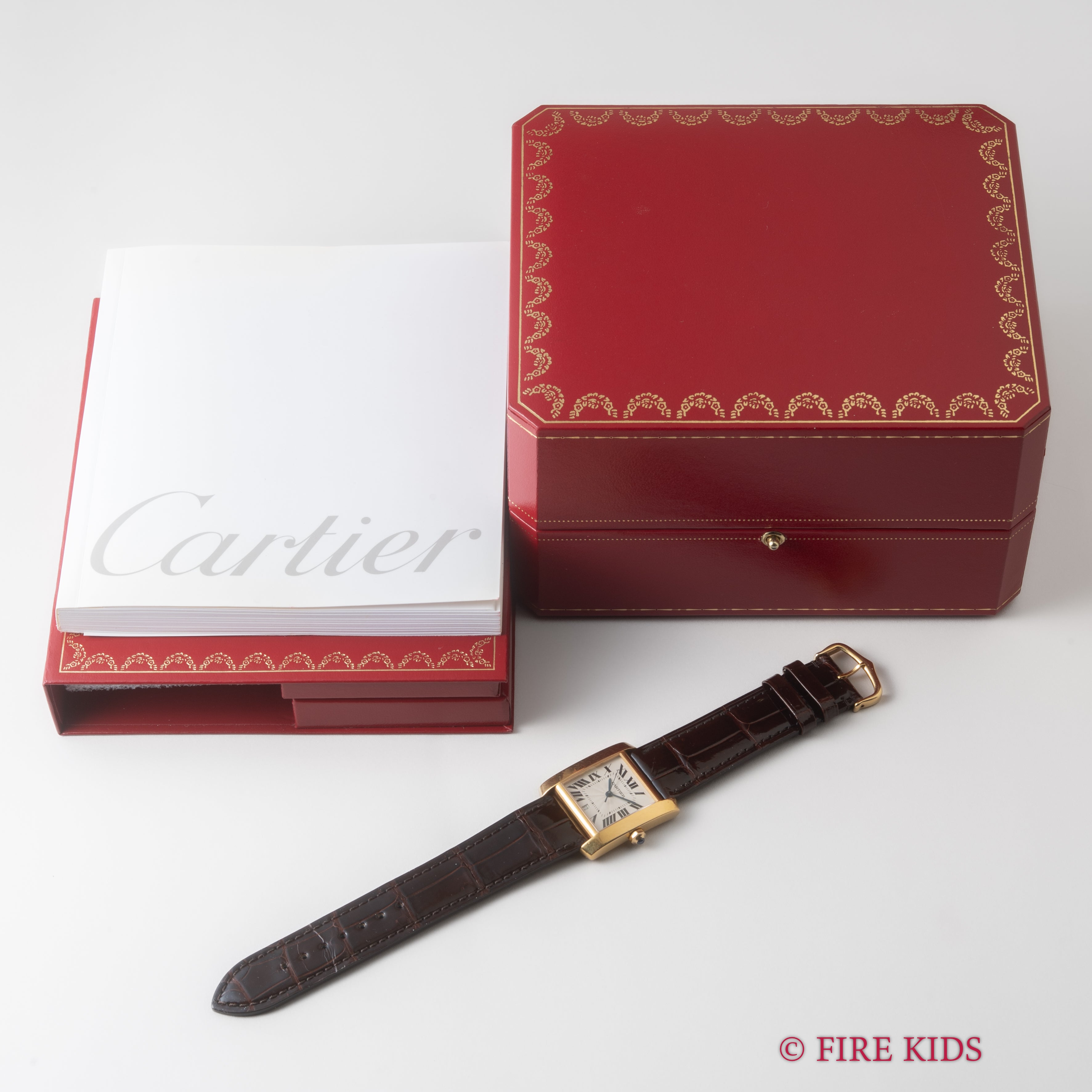 カルティエ 18金無垢イエローゴールド タンクフランセーズ LMサイズ 1990年代製 ギョーシェダイヤル 純正金無垢尾錠付き 箱、冊子付き