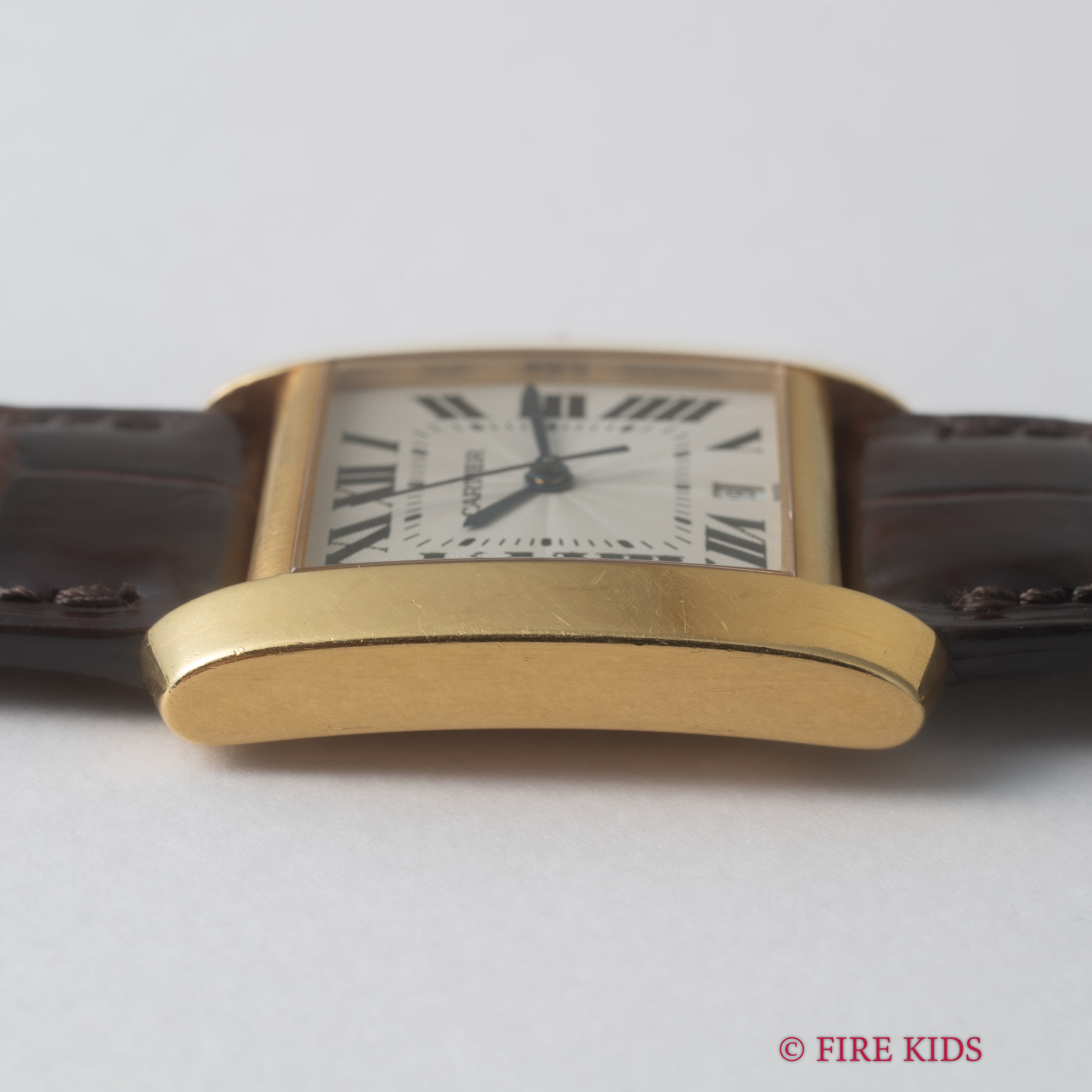 カルティエ 18金無垢イエローゴールド タンクフランセーズ LMサイズ 1990年代製 ギョーシェダイヤル 純正金無垢尾錠付き 箱、冊子付き