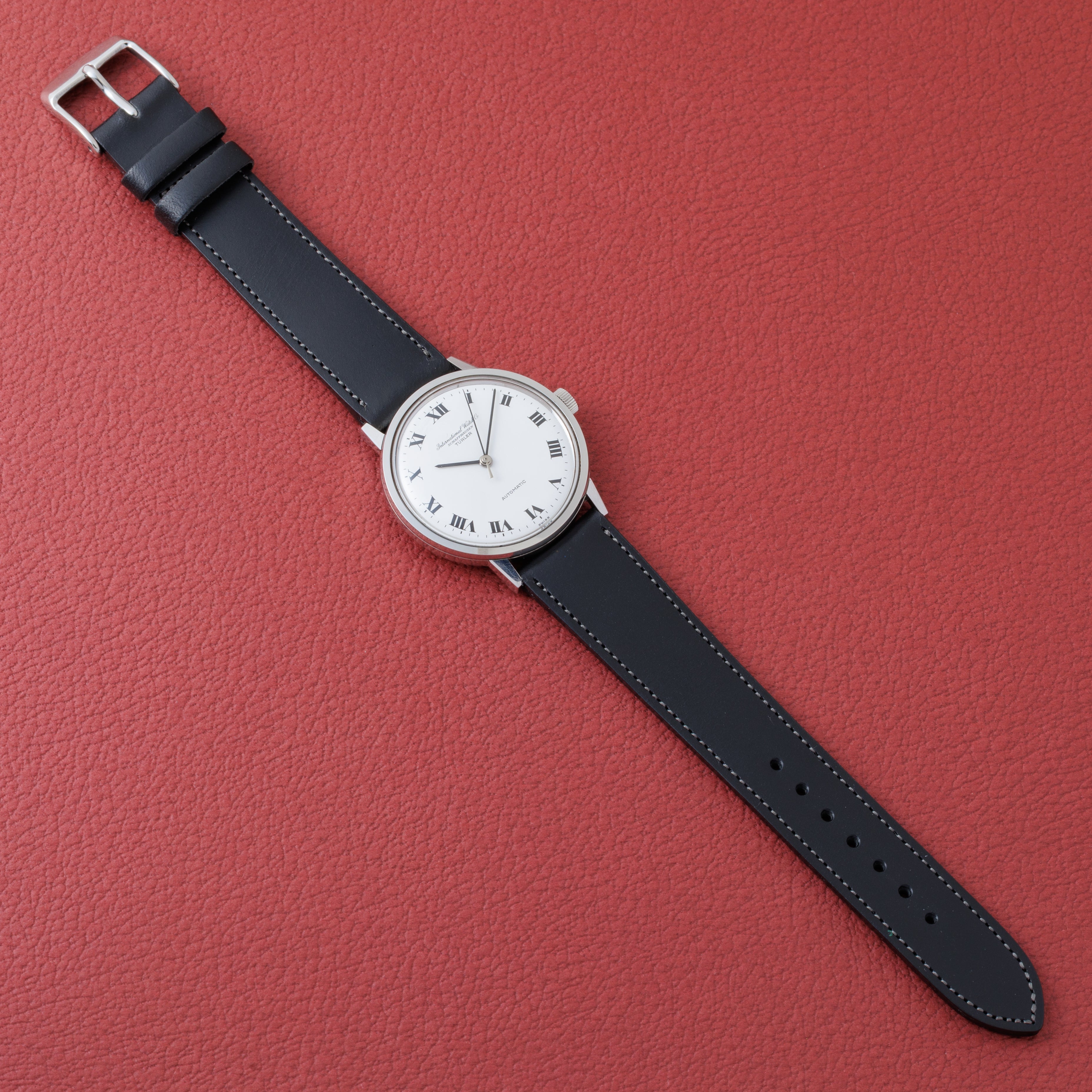 IWC ラウンドモデル オートマチック チューラーダブルネーム ホワイトローマンダイヤル 1969年製 お魚リューズ