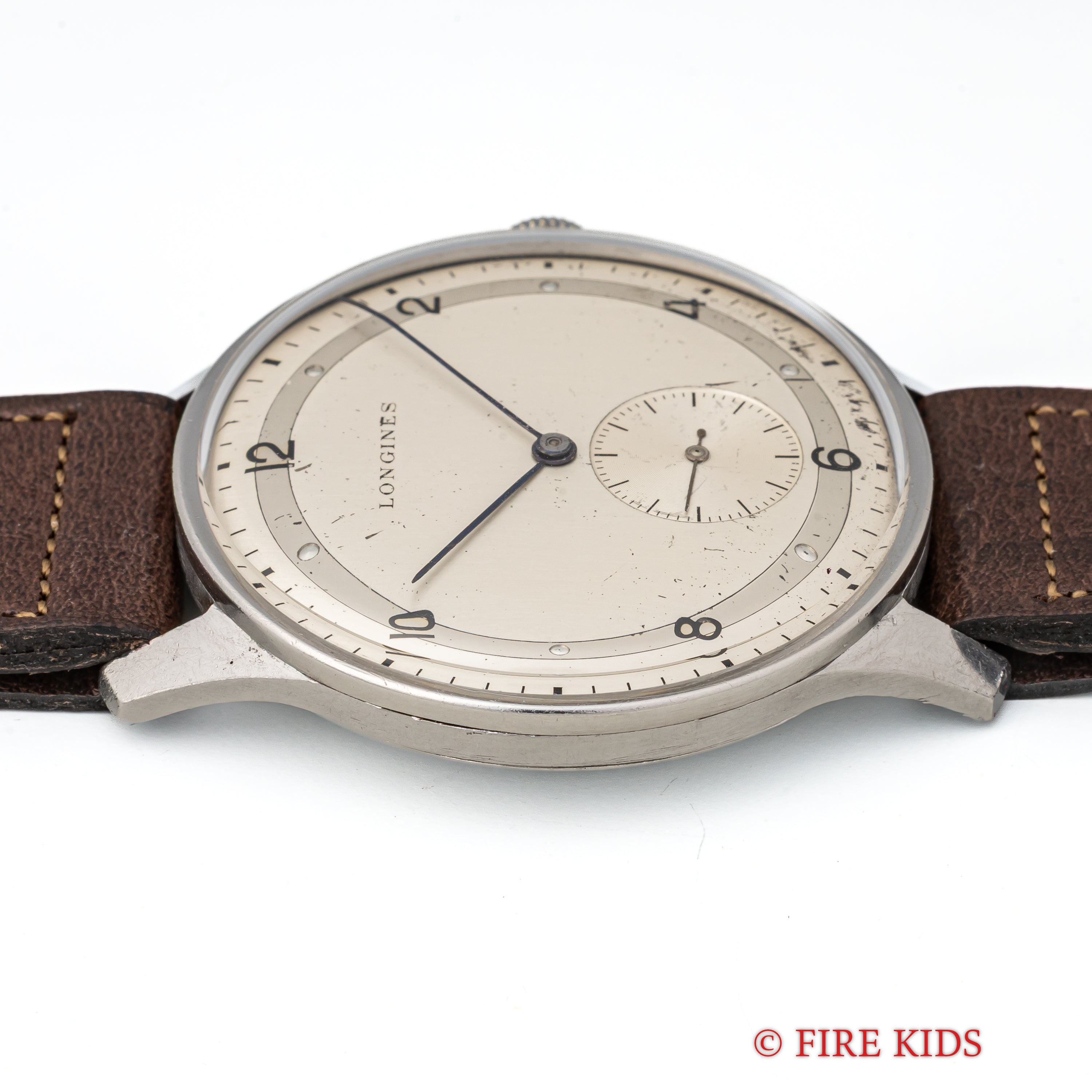 ロンジン 37㎜ビッグケース 1947年製 スモールセコンド手巻 Cal.12.68Z 飛びアラビアブルズアイダイヤル