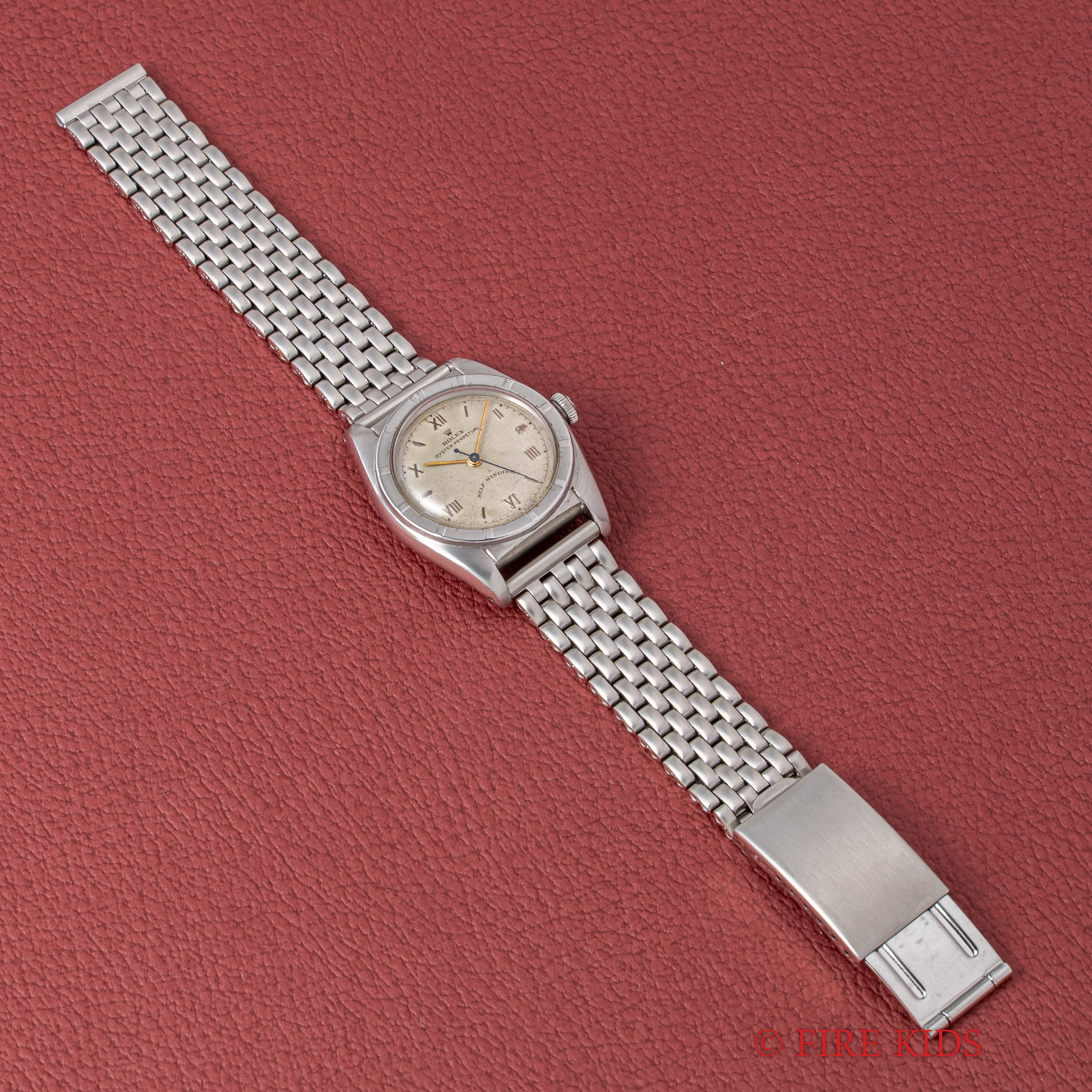 ロレックス バブルバック 1949年製 Ref.6015 自動巻 エンジンターンドベゼル 飛びローマンダイヤル 社外ライスブレス