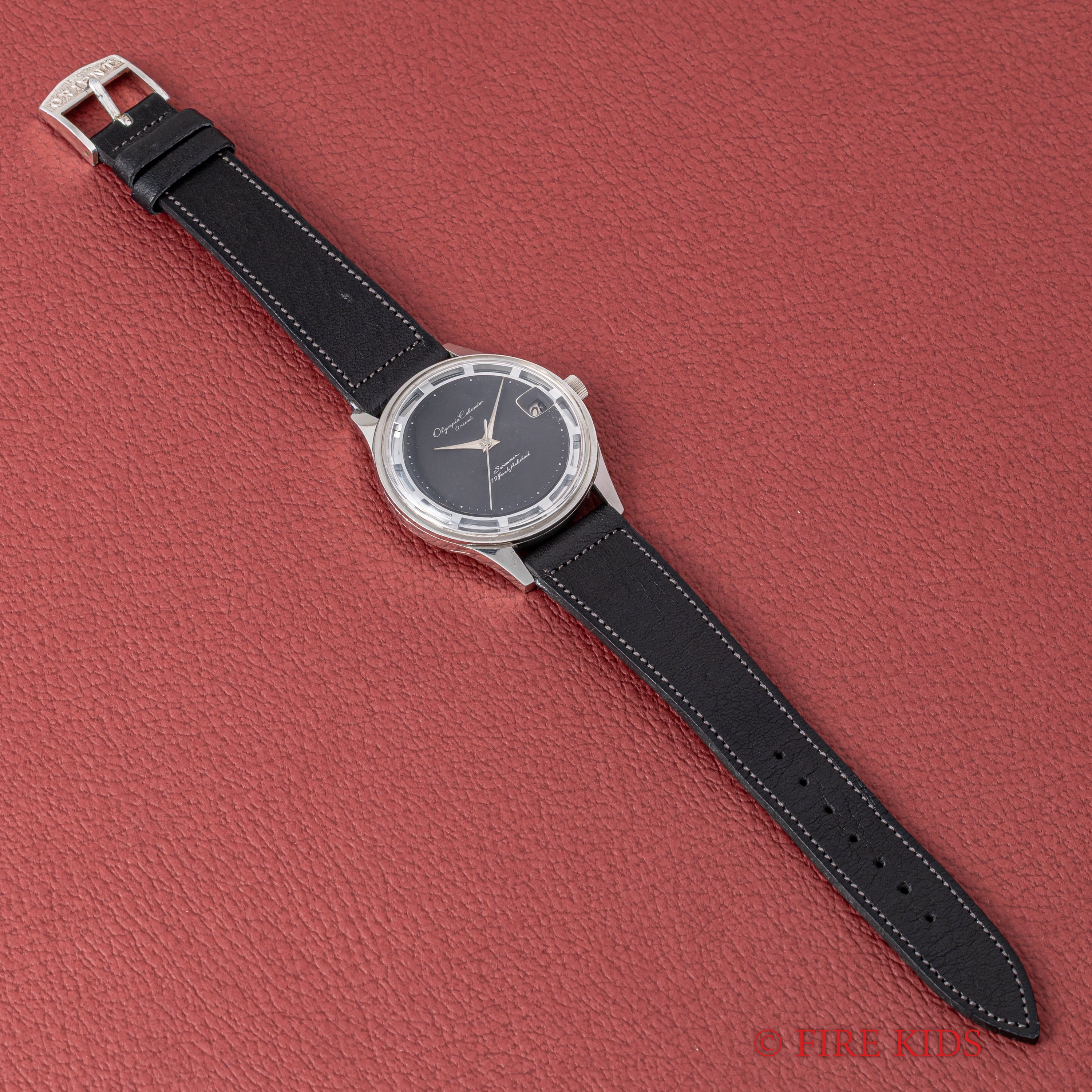 オリエント オリンピアカレンダー ブラックダイヤル 1960年代製 純正尾錠