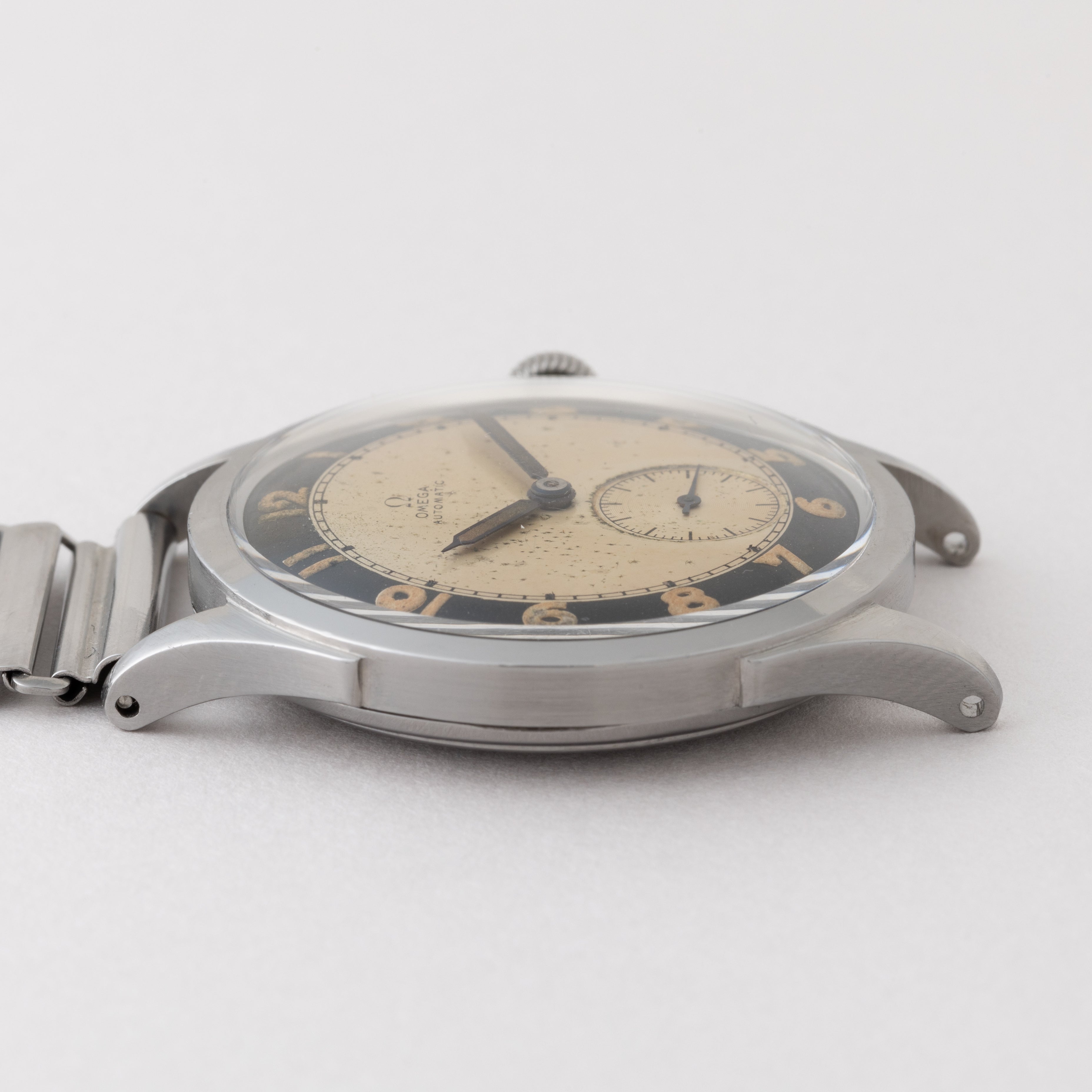 オメガ バンパー式オメガ初オートマチック 1943年製 ツートンアラビアダイヤル